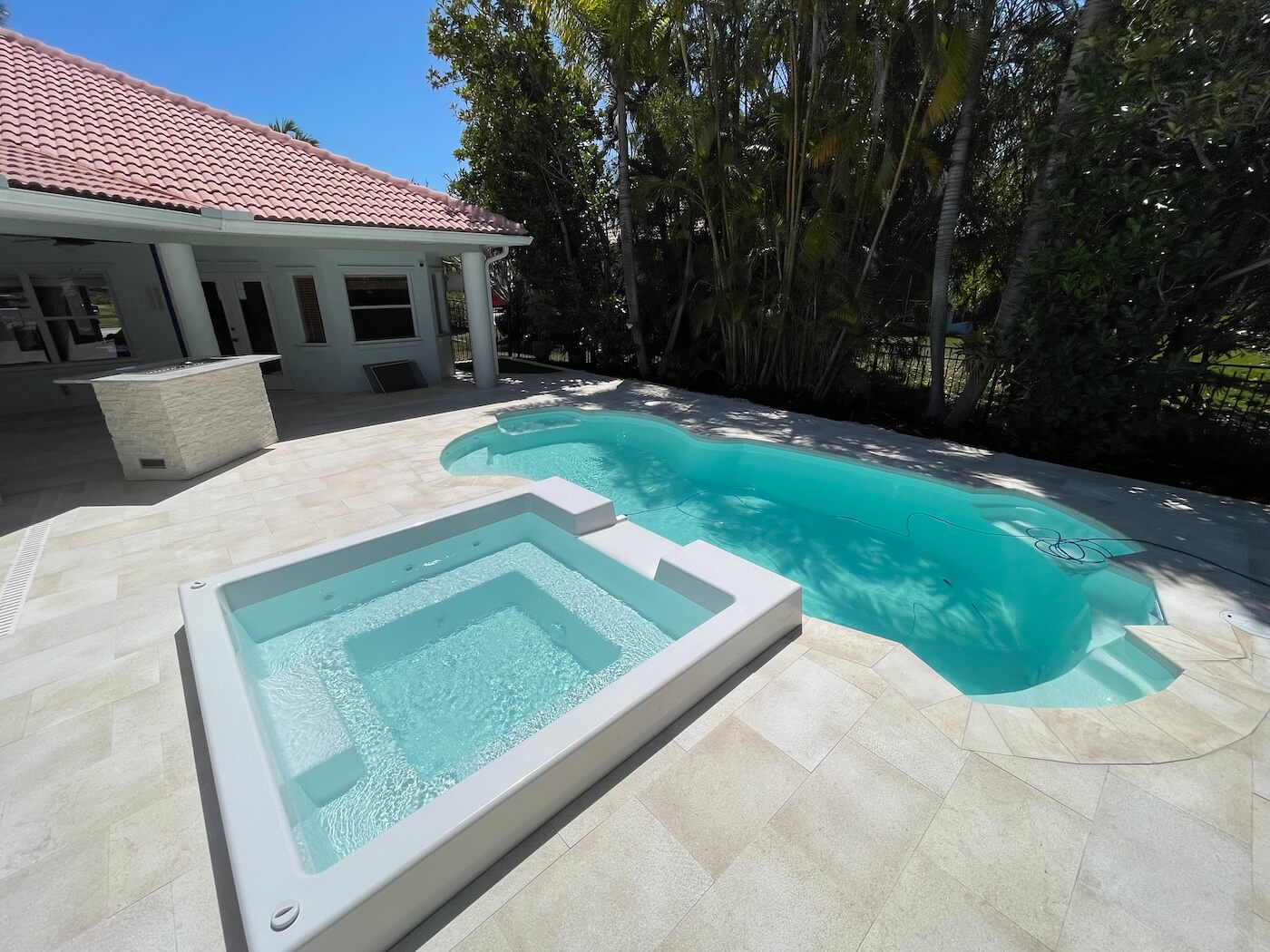 Modern fiberglass hot tub on a deck